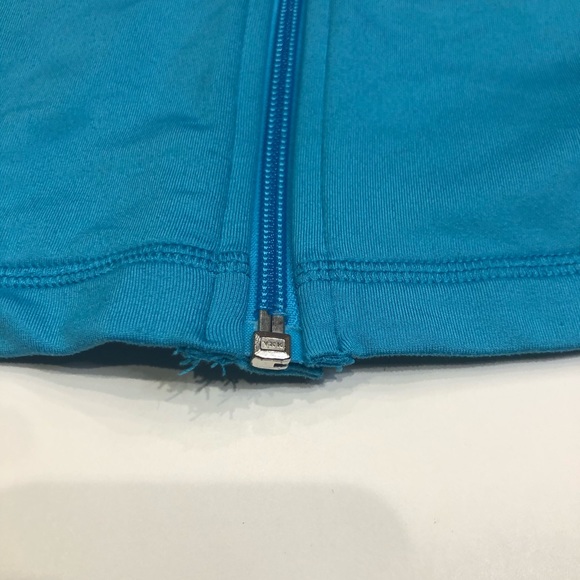 Champions Women’s Turquoise Running Sweater - Picture 4 of 8